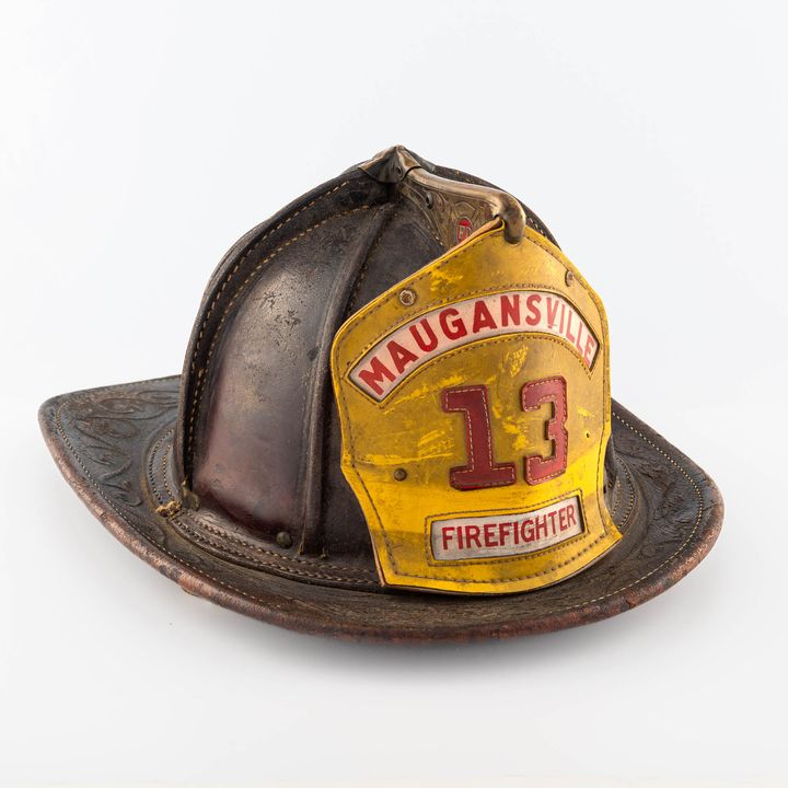 A Cairns & Brothers leather fire helmet
