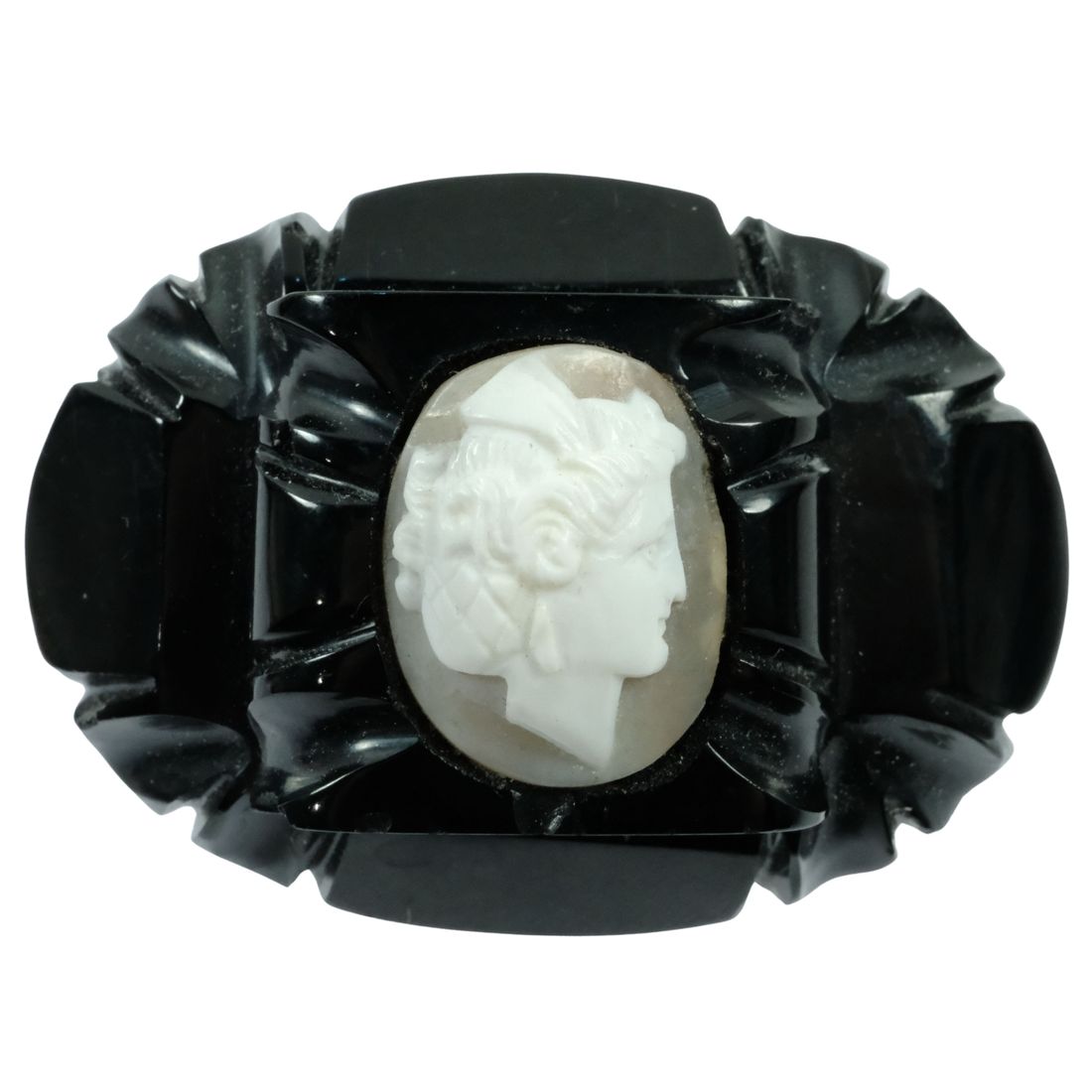 Classic Brooch with the Head of a Lady carved in White Composite and Set in Whitby Jet