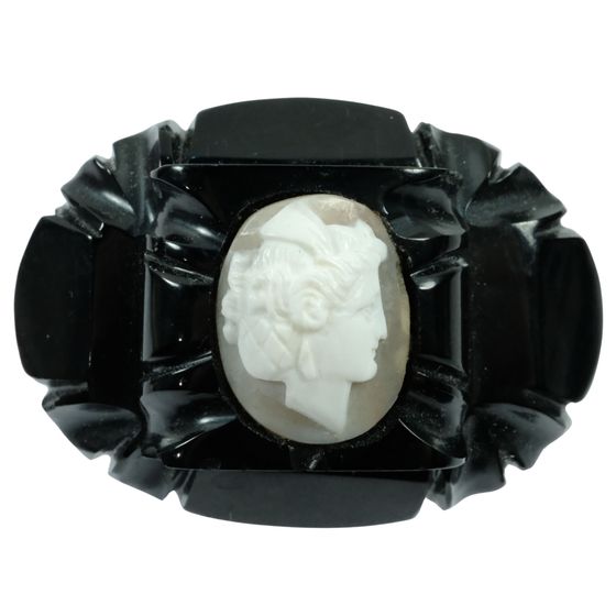 Classic Brooch with the Head of a Lady carved in White Composite and Set in Whitby Jet