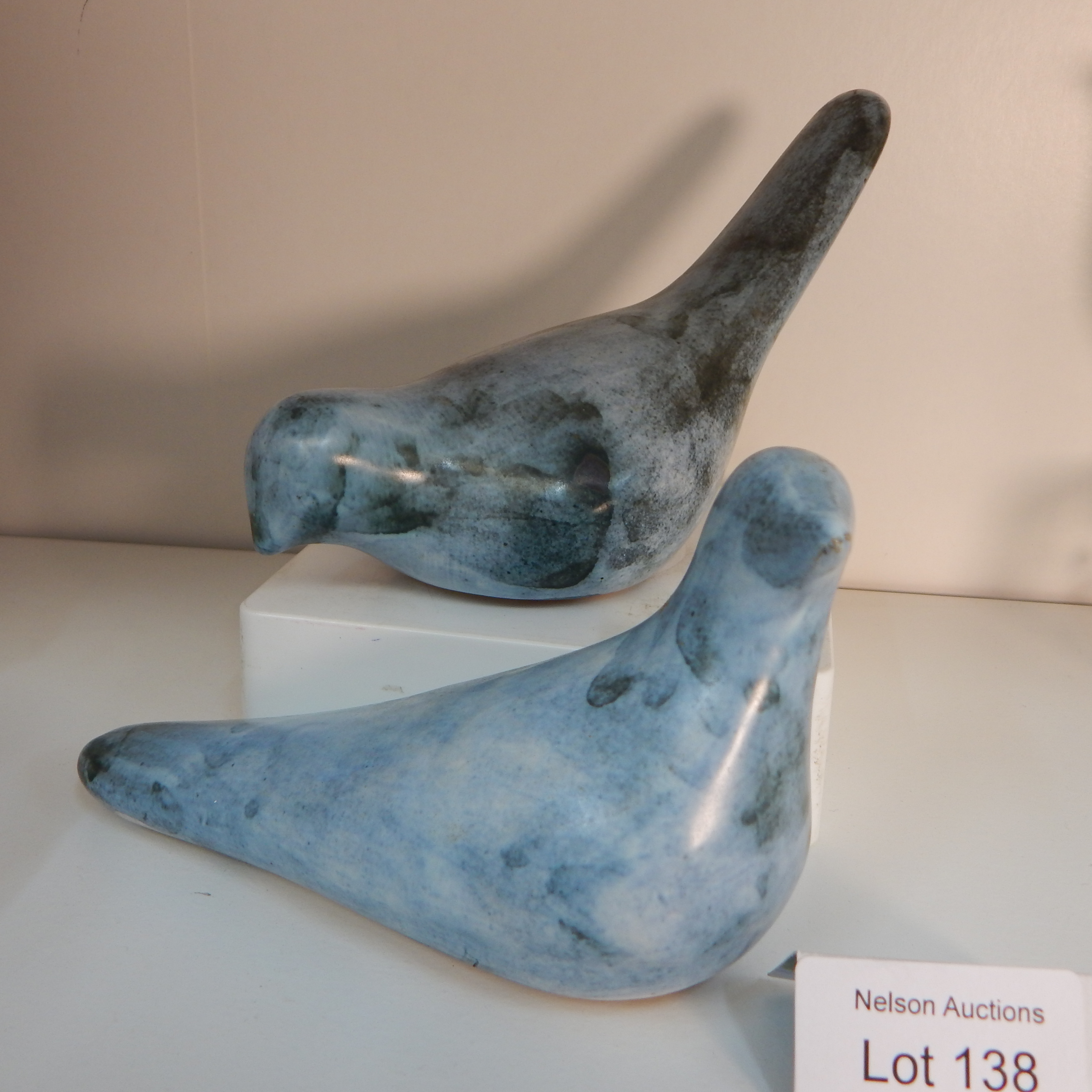 Pair handmade blue glazed birds - no marks — sold at auction in New Zealand for $15