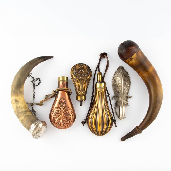 A group of six powder horns and flasks