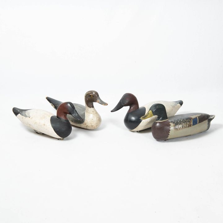 Four vintage working duck decoys