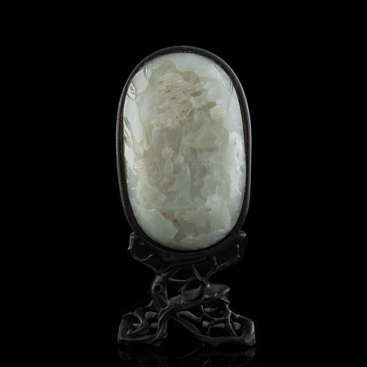 十九世紀 白玉雕山水人物瓦頭（附原配硬木座） A Chinese carved white jade 'landscape' plaque, 19th century