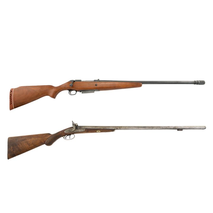 Two antique shotguns