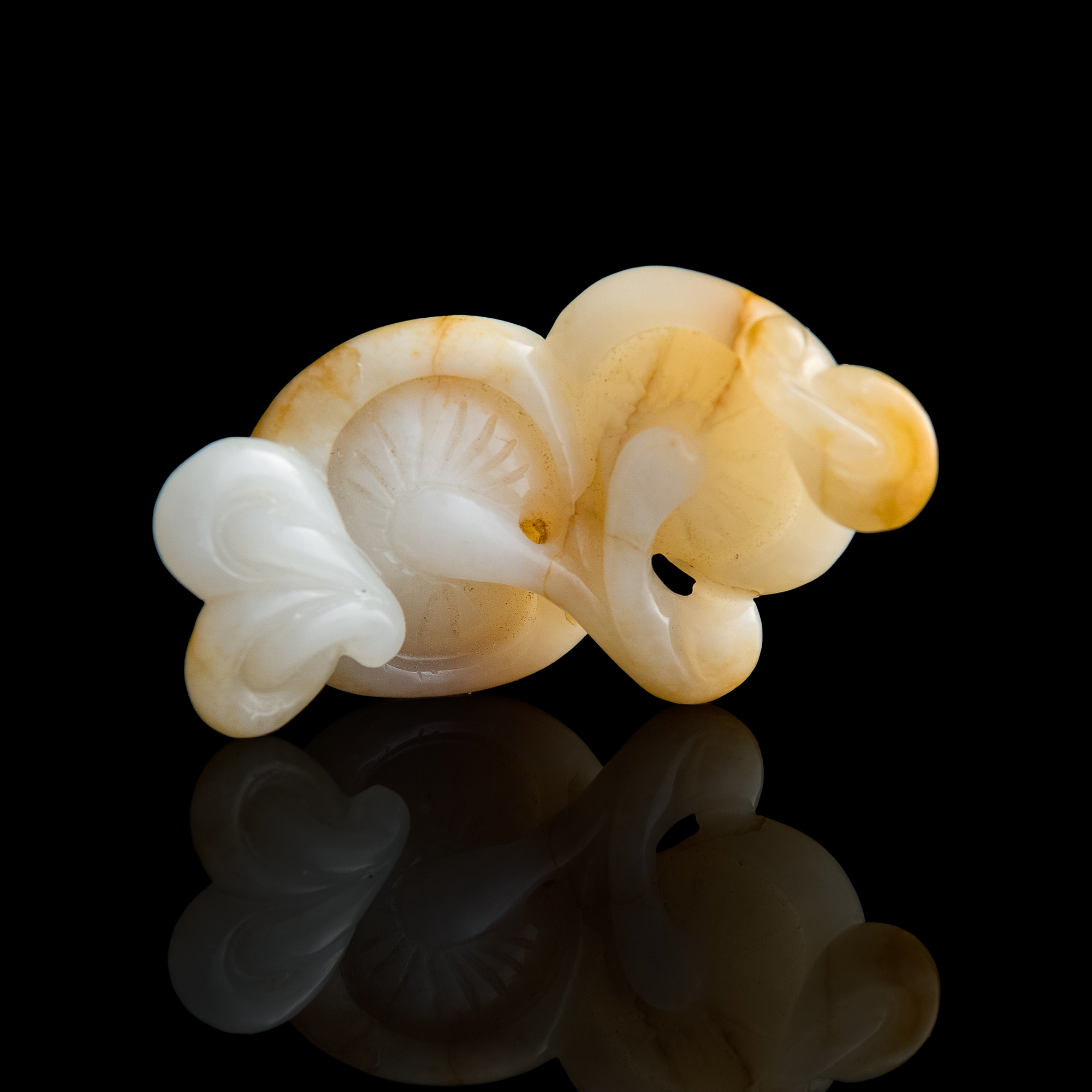 A carved white jade 'butterfly' tripod censer and cover