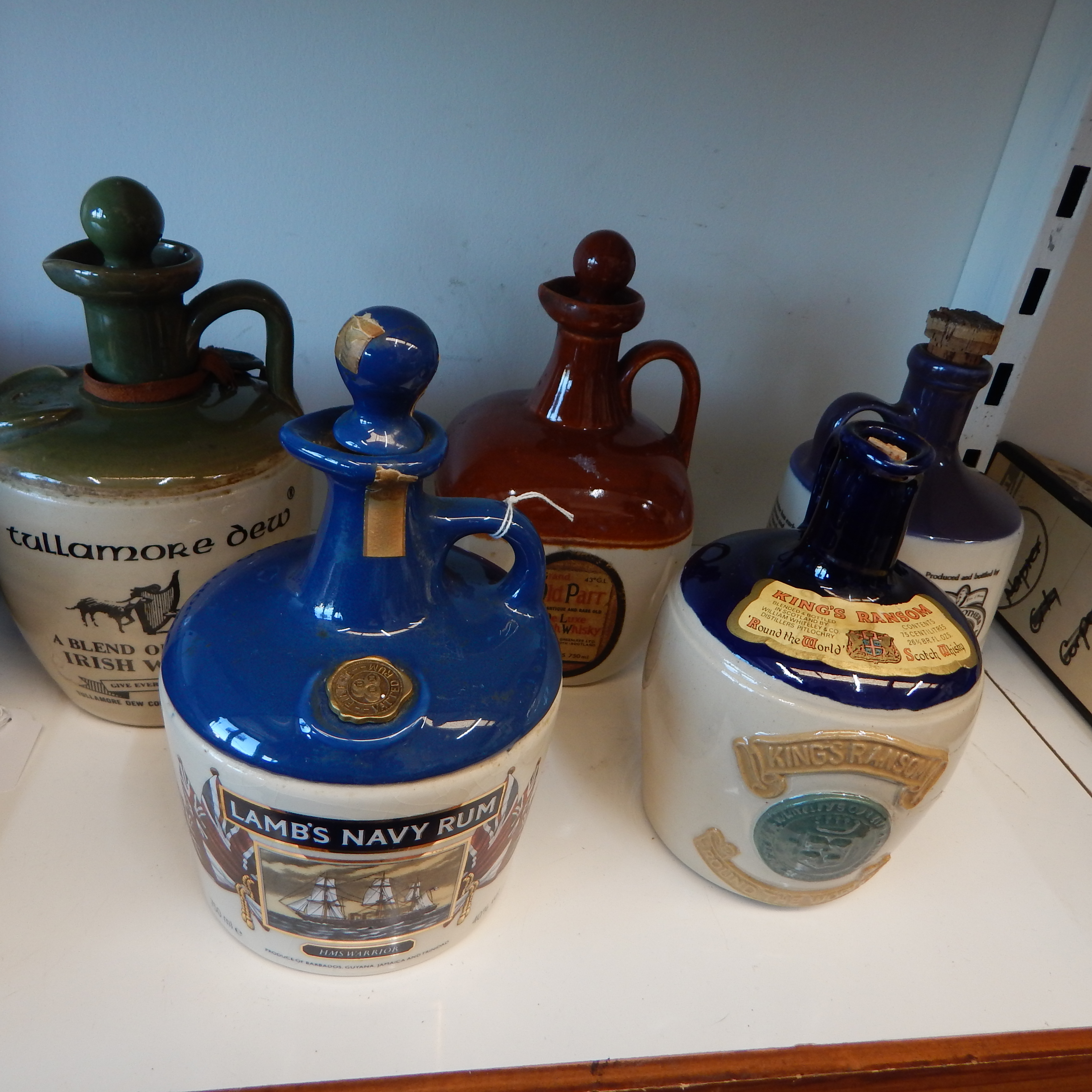 5 Whisky/Rum etc Decorative Ceramic Bottles — sold at auction in New Zealand for $30