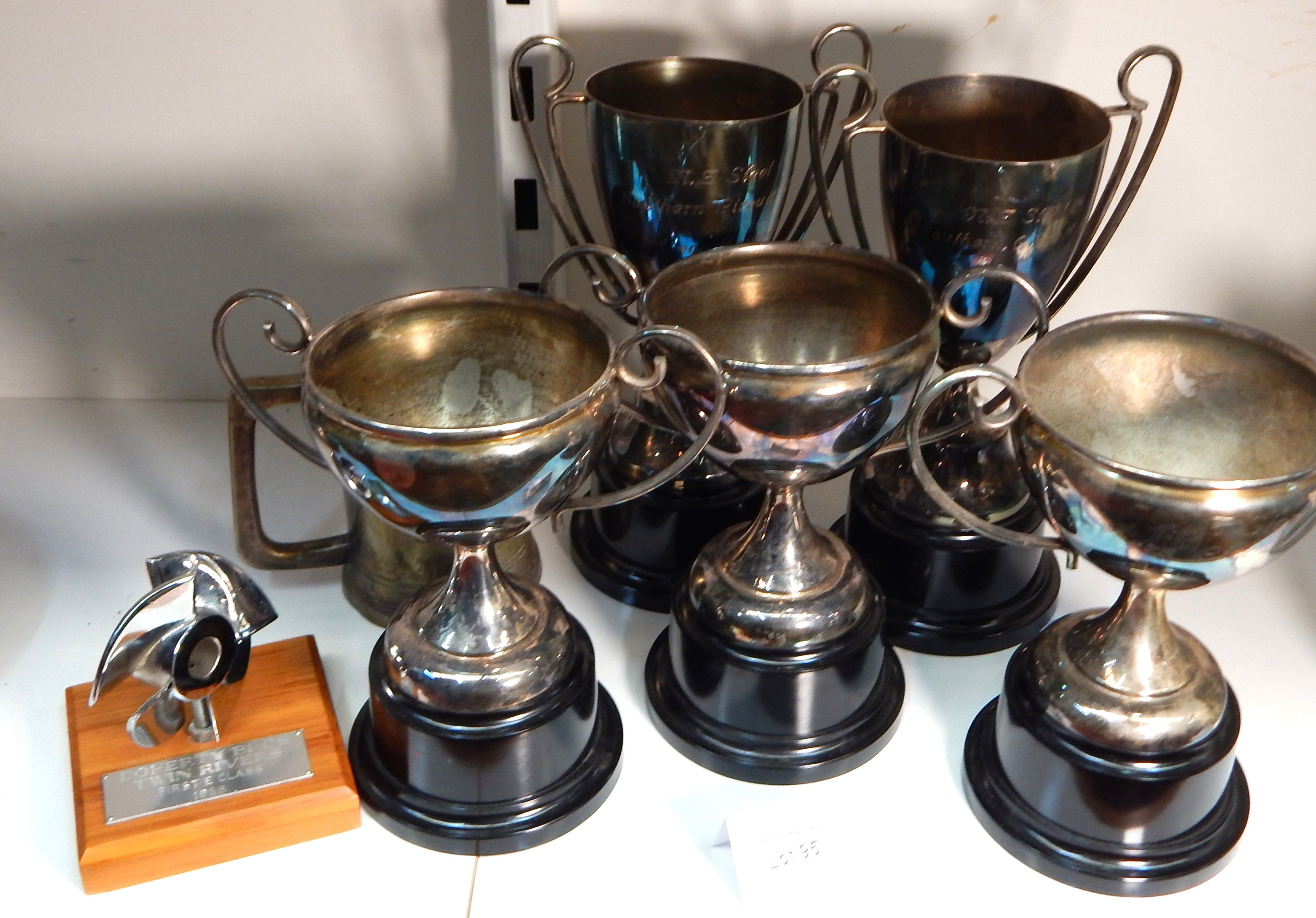 7 Assorted vintage trophies — sold at auction in New Zealand for $10
