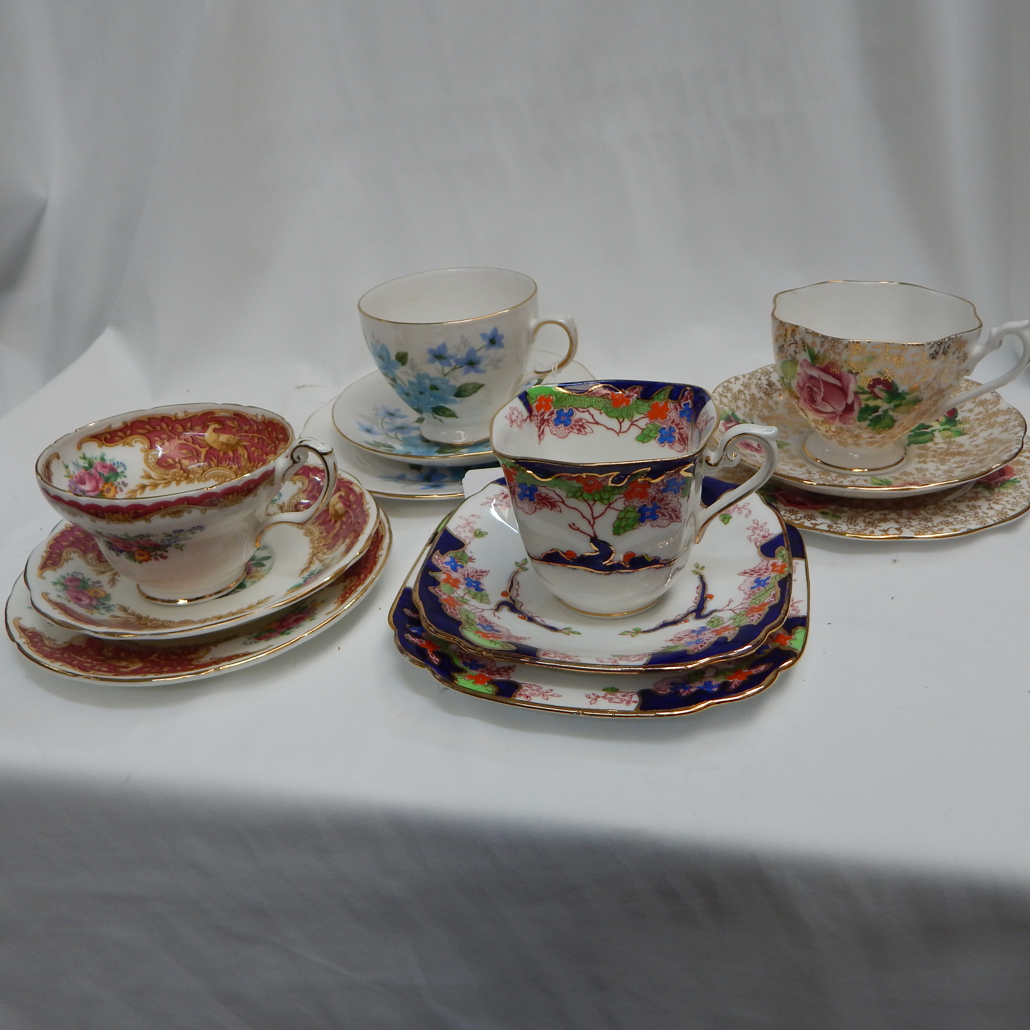 4 Assorted Trios incl 2 x Queen Anne etc — sold at auction in New Zealand for $10