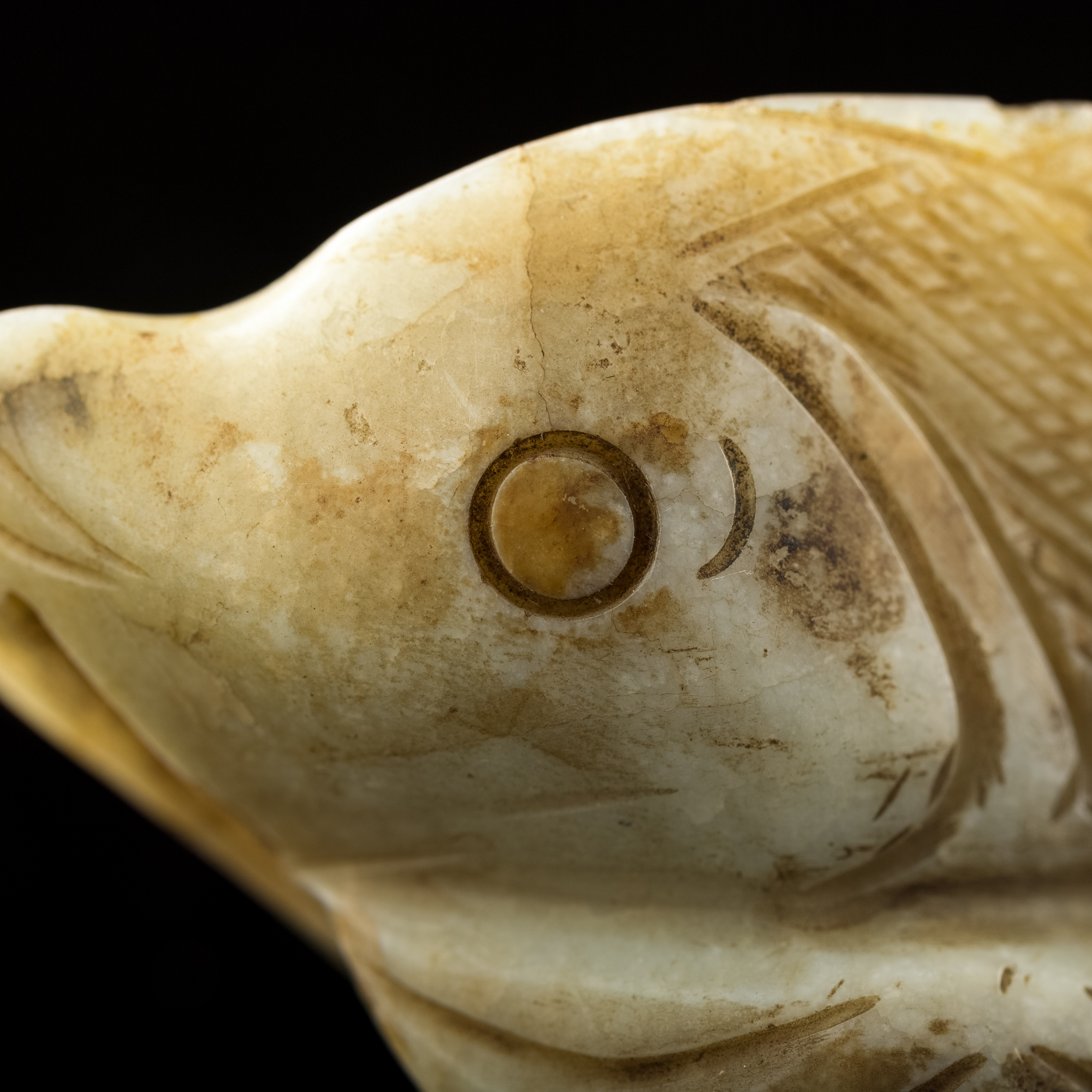 明代玉雕魚A Chinese carved jade 'fish' figure, Ming dynasty 明代玉雕魚A Chinese carved jade 'fish' figure, Ming dynasty