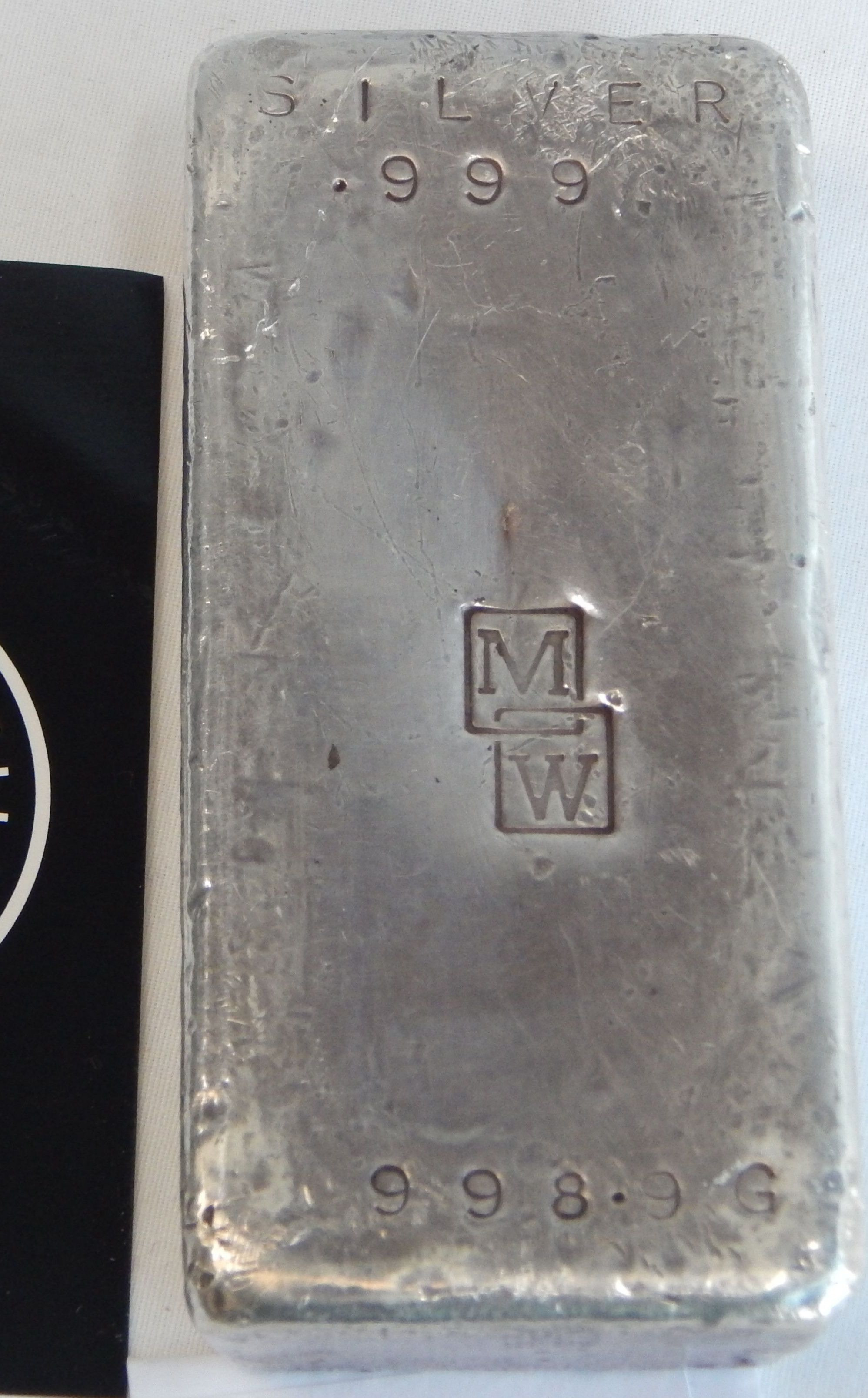 Sterling Silver Ingot - .999 Pure - 998.96g — sold at auction in New Zealand for $3,500