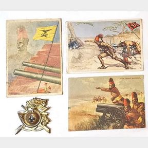 WW2.Italian Askari Badge & Postcards