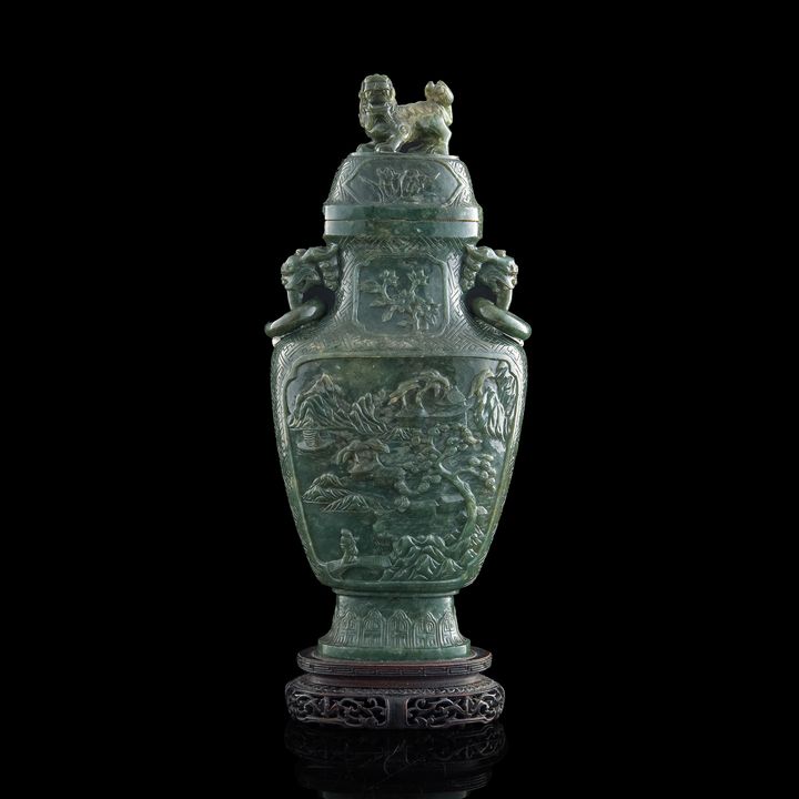 十九世紀早 碧玉雕山水亭臺蓋瓶(附原配硬木座) A Chinese carved spinach jade 'landscape' lidded vase, early 19th century