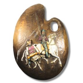 Wall-hanging in the shape of a Artist's Pallete with Don Quixote design