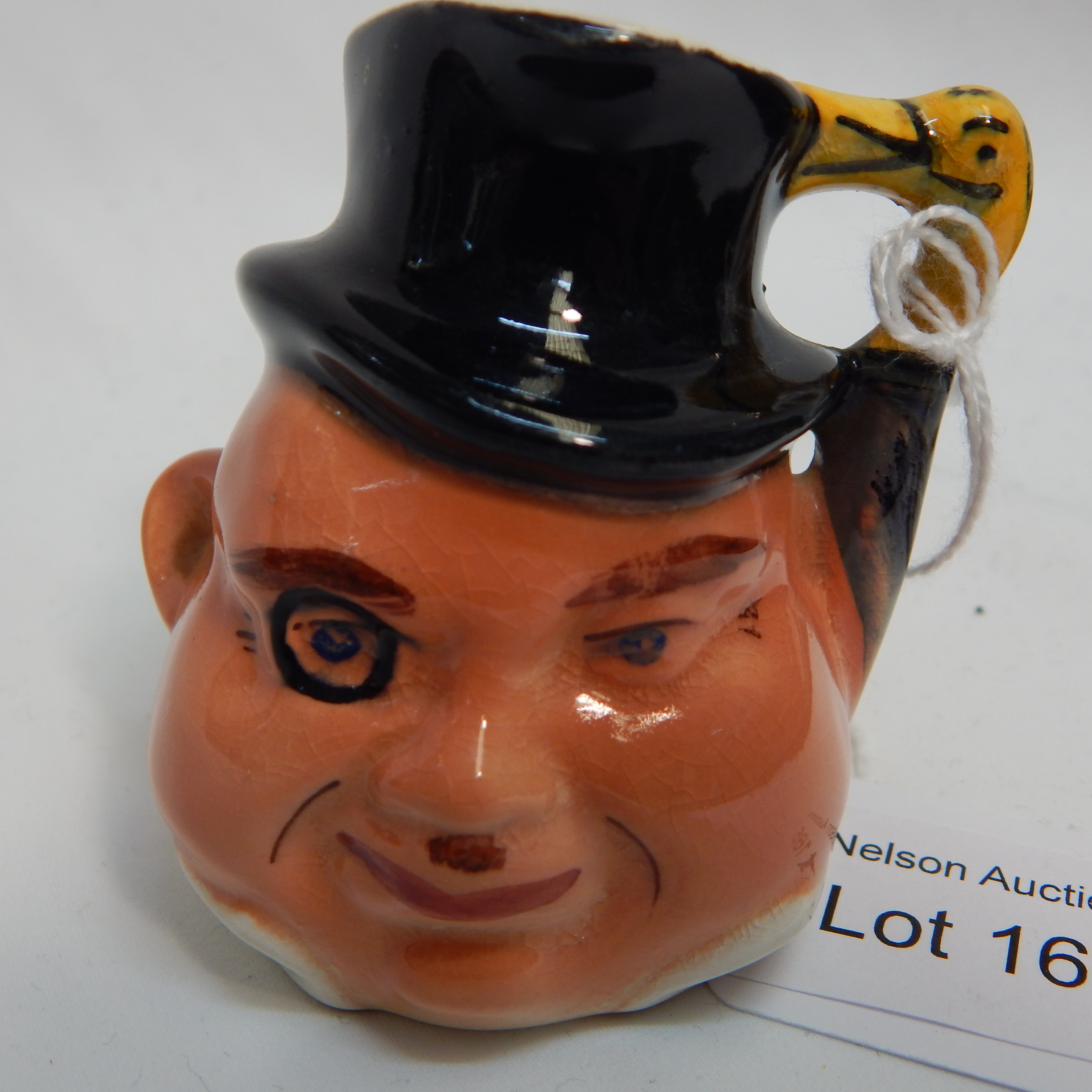 c1950 Burlington Ware Mini Toby Jug Archie — sold at auction in New Zealand for $10