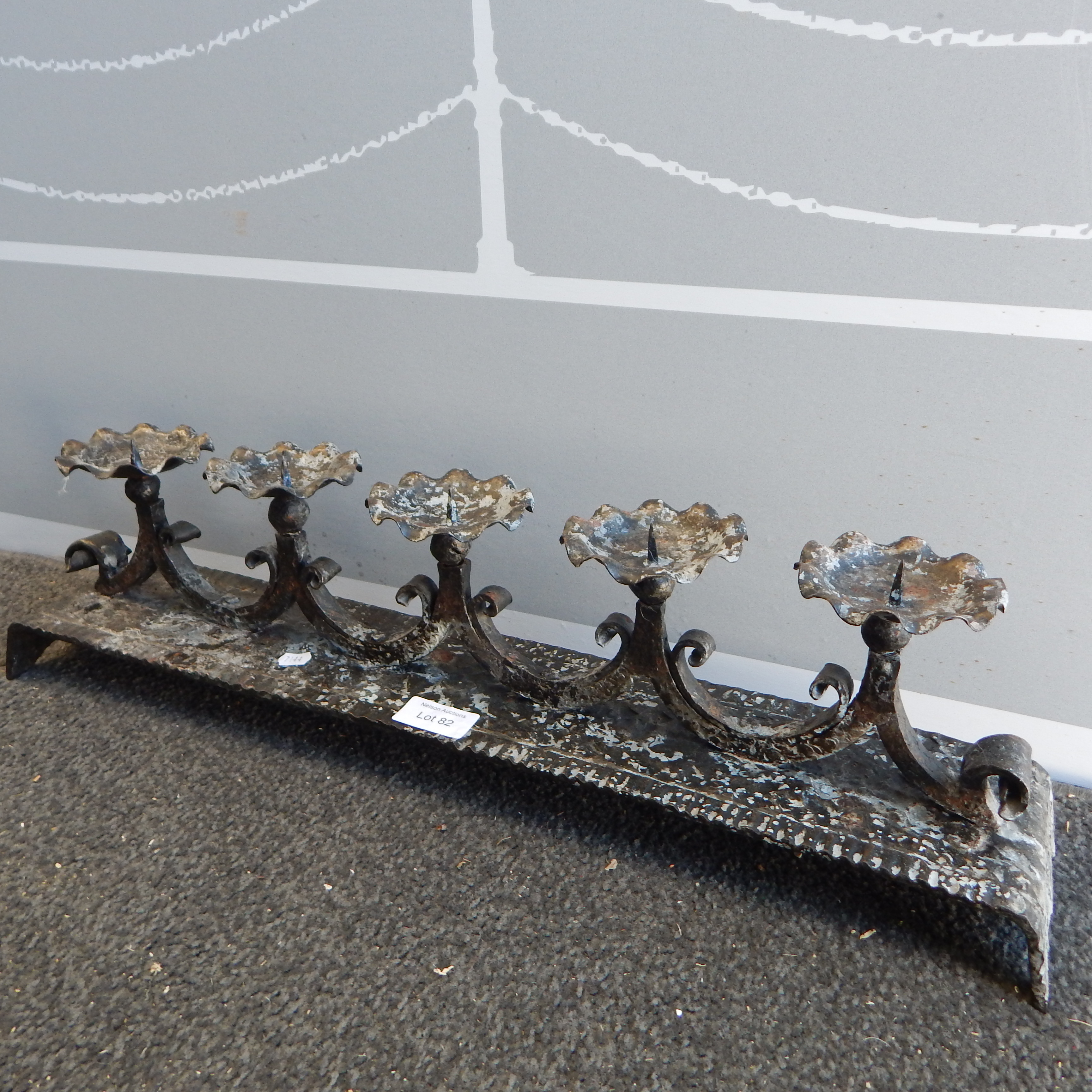 Wrought Iron Candle Holder - horizontal — sold at auction in New Zealand for $25