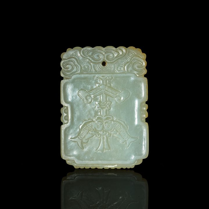 十八世紀 白玉雕吉慶有餘牌 A Chinese white jade plaque, 18th century