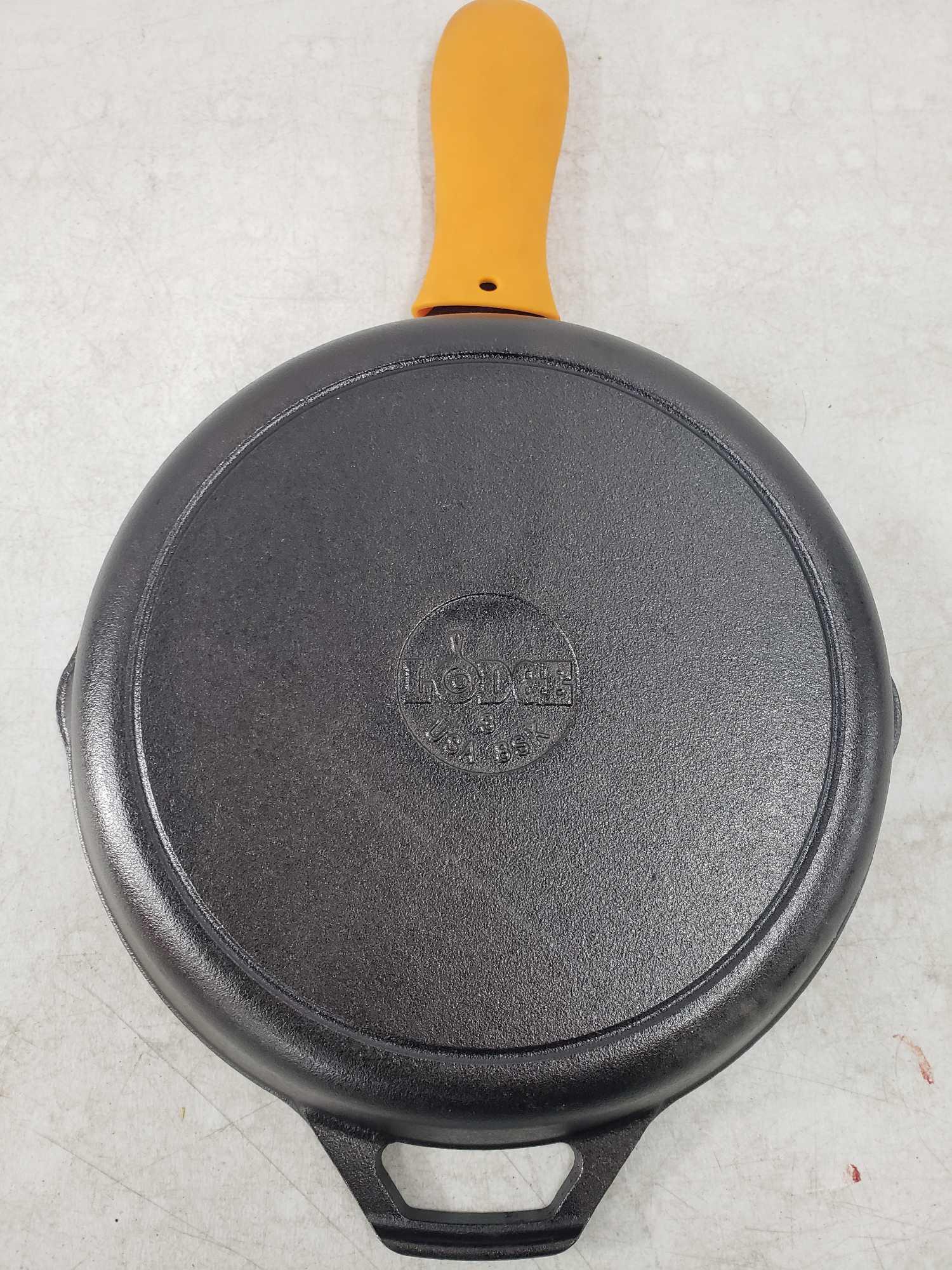 Lodge 10 .25 in Cast Iron Skillet in Black with Orange Silicone