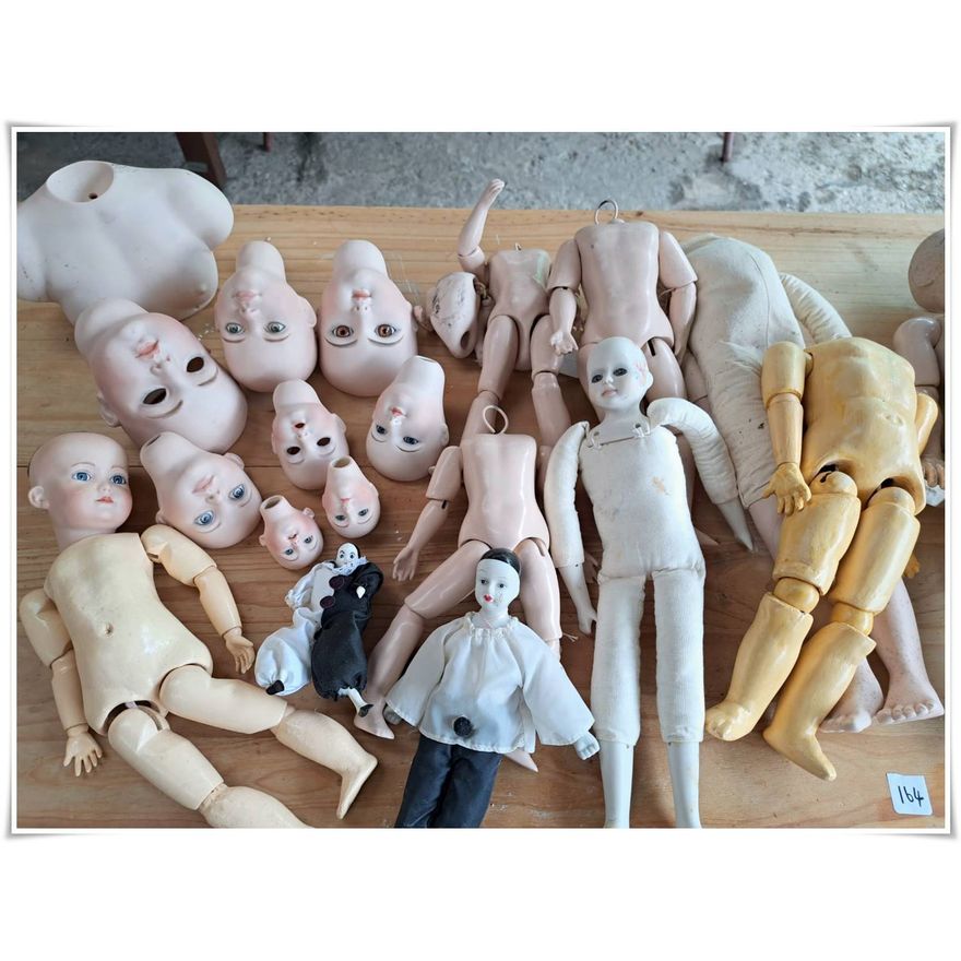 Collection of porcelain dolls & doll making parts