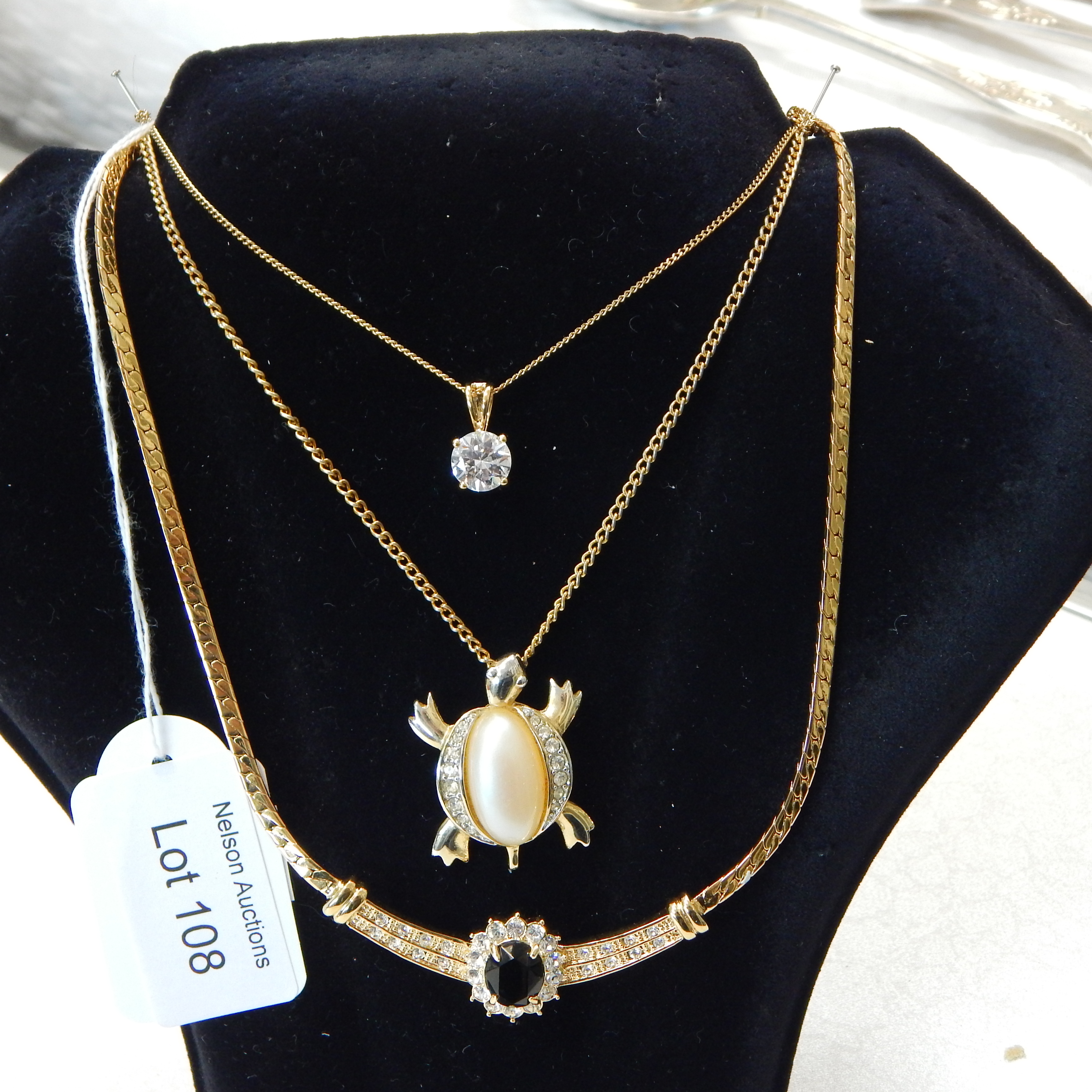 3 Gold-tone Pendants and Chains — NZ auction result