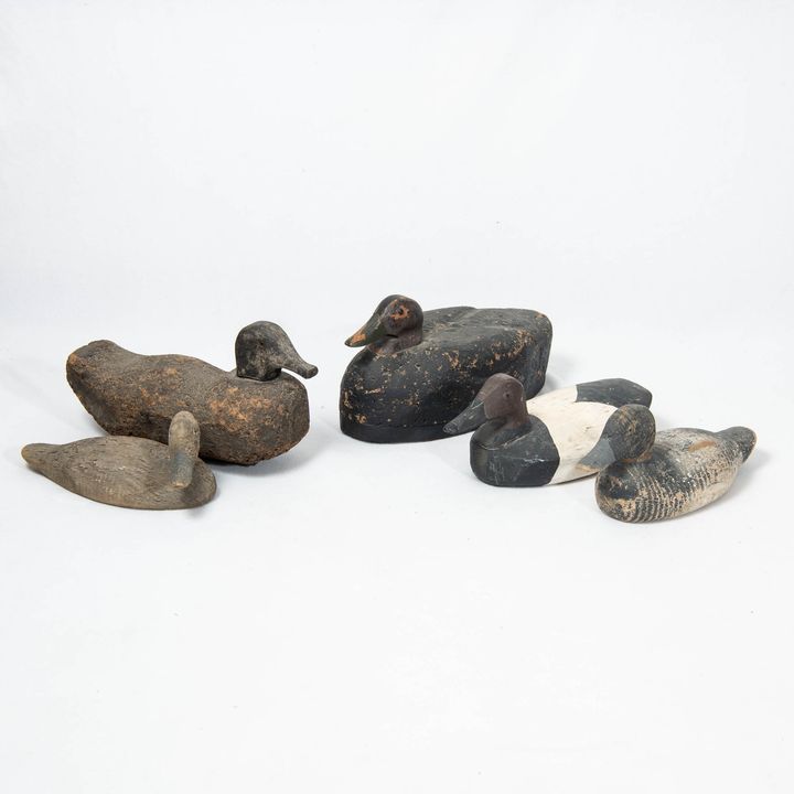 Five antique working wooden duck decoys