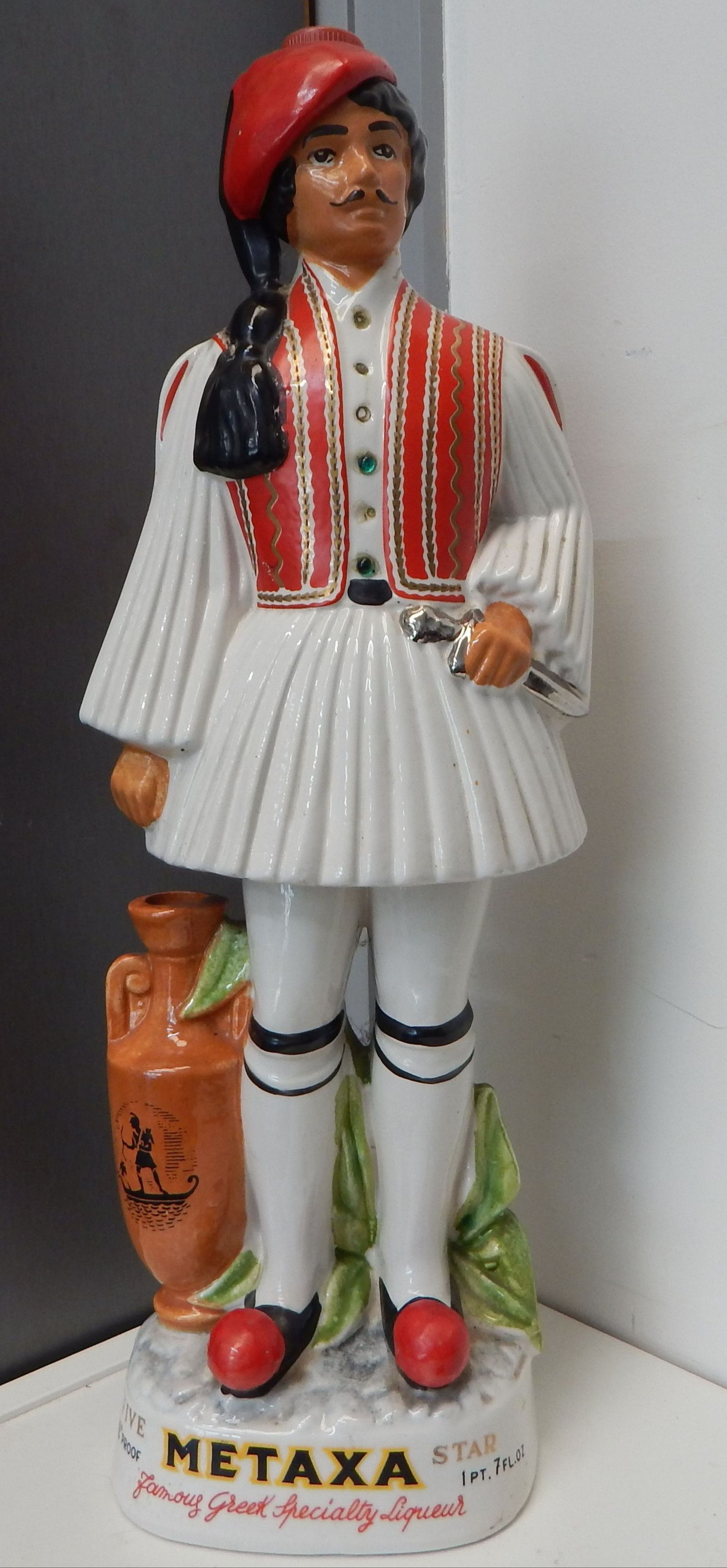 Vintage Metaxa Greek liqueur bottle - Greek Soldier — sold at auction in New Zealand for $20