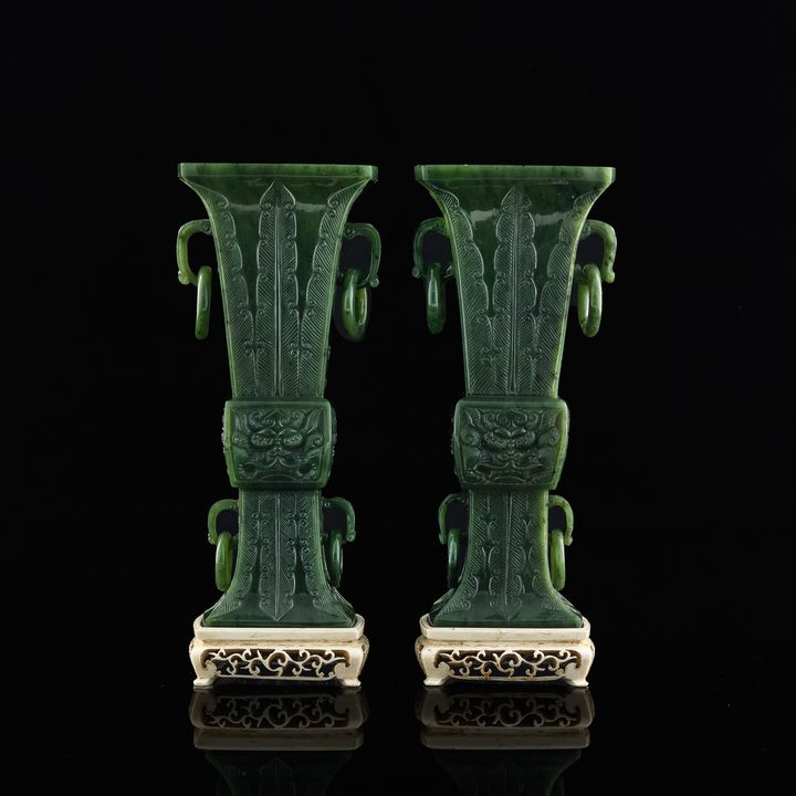 十九世紀 碧玉雕饕餮紋花觚一對(均附座) A pair of Chinese carved spinach jade gu vases, 19th century