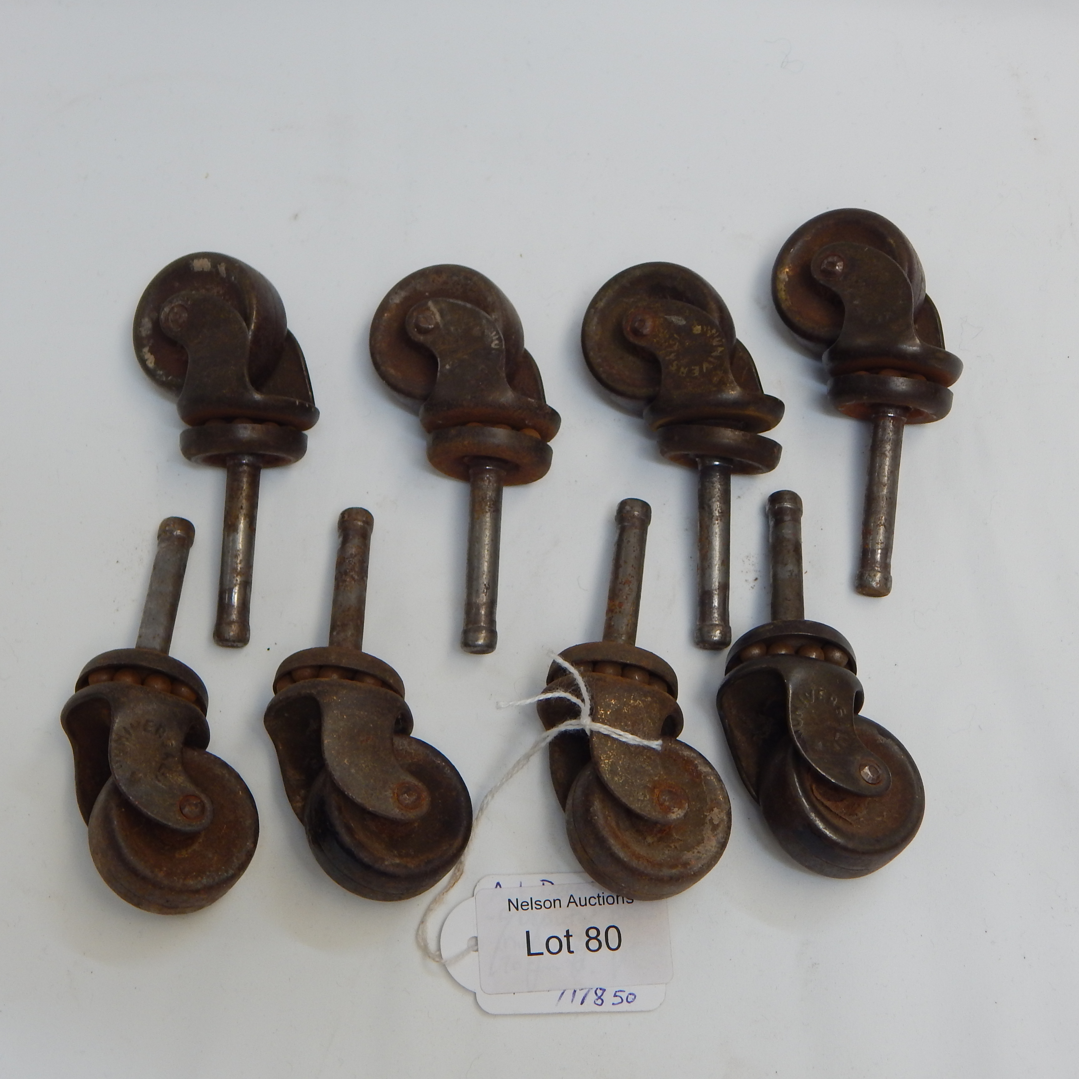 8 x Vintage Universal metal castors — NZ auction result