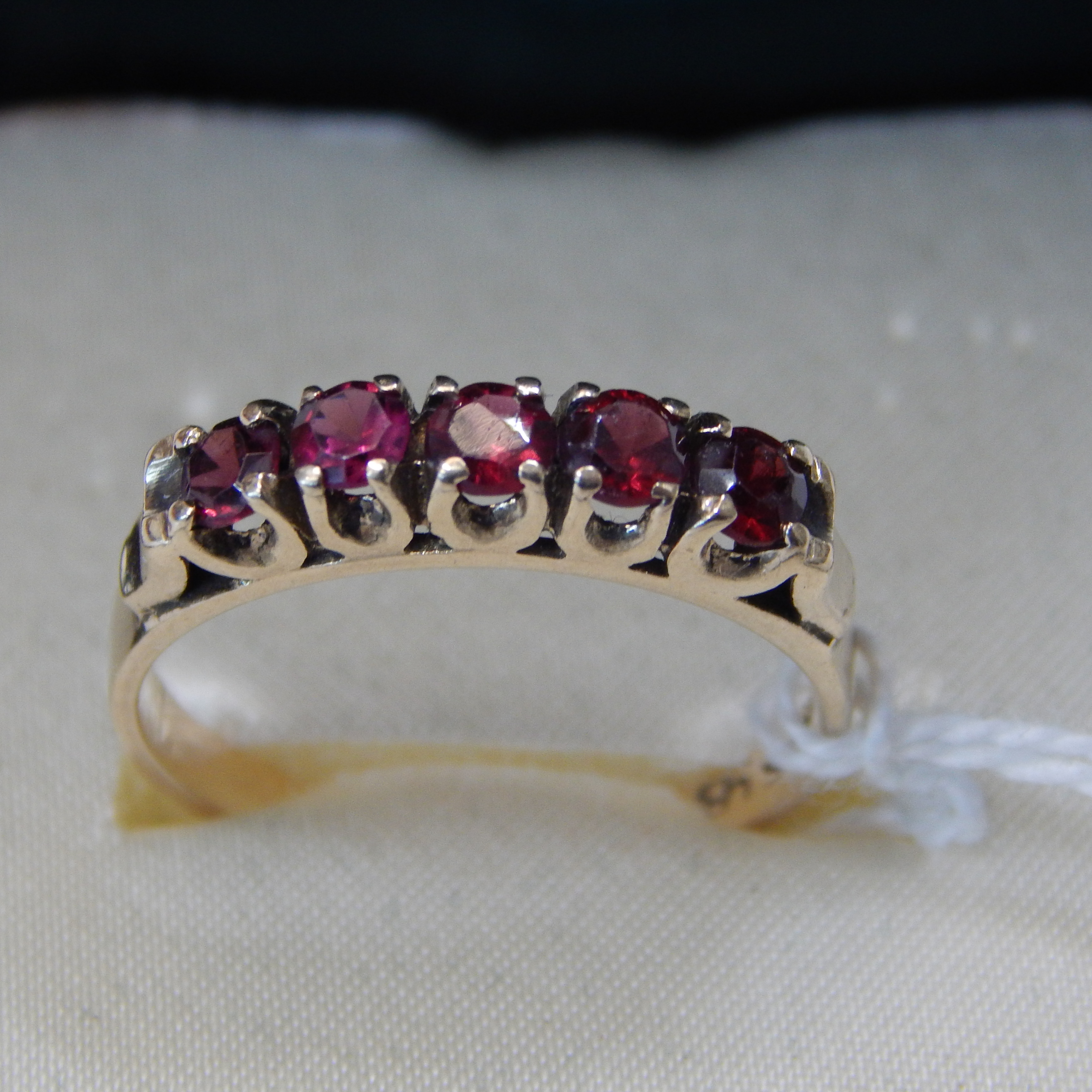 9ct Gold Ring w 5 Garnets — sold at auction in New Zealand for $220