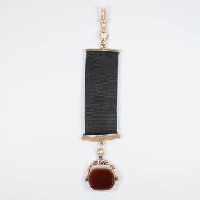 Carnelian Seal in 9ct Gold surround with fabric suspender