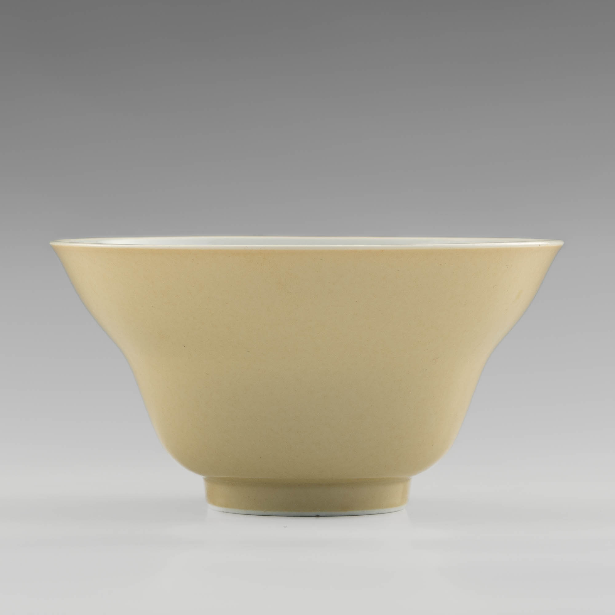 清乾隆米黃釉折腰碗A Chinese yellow-glazed bowl, Qianlong