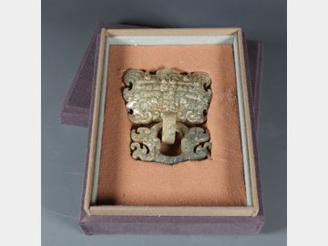 Ancient jade door knocker with animal face pattern
