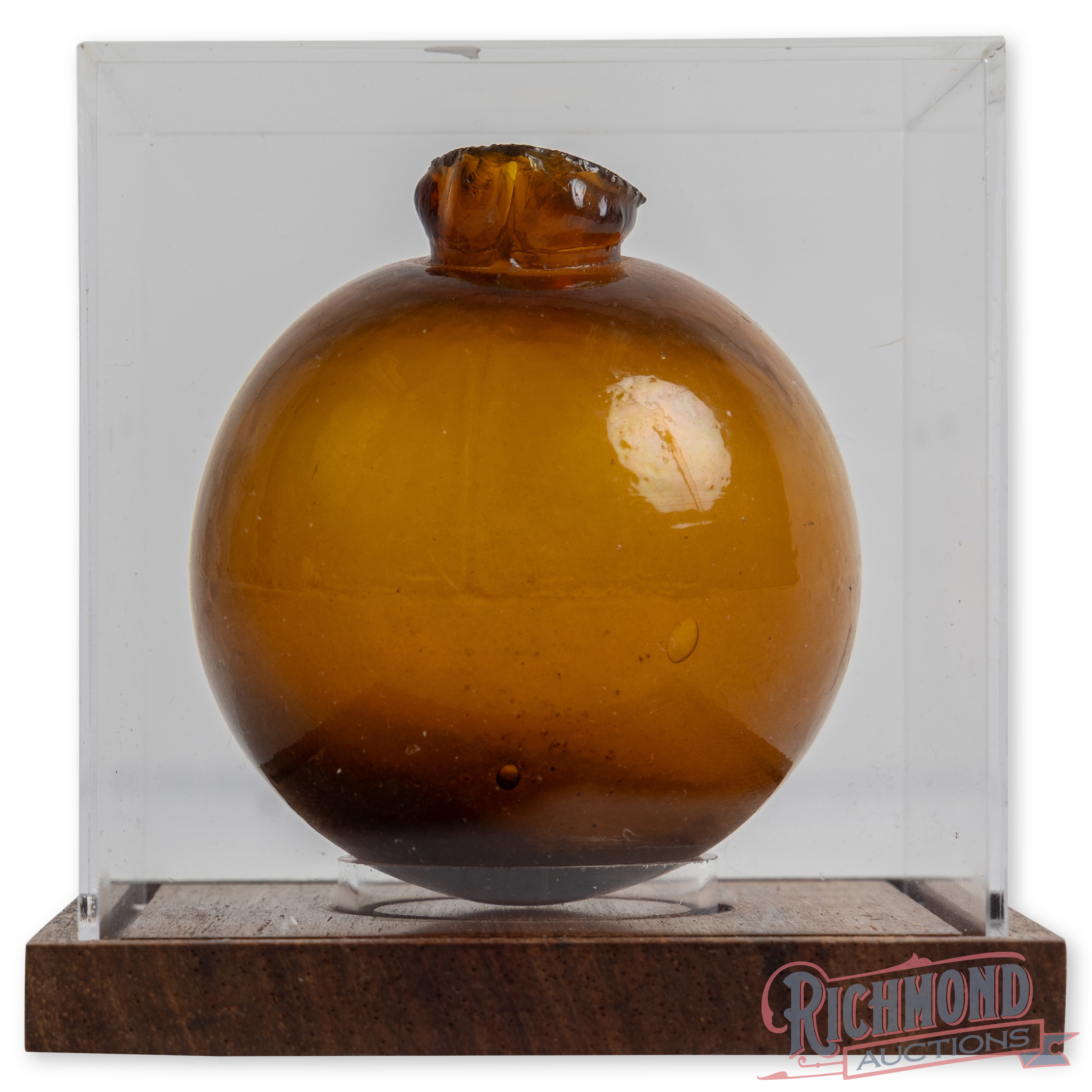 Antique Amber Glass Target / Trap Ball in Display Case | Richmond Auctions
